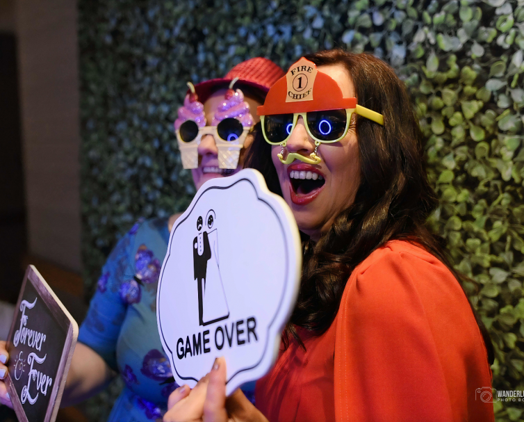 employees having fun in an augmented reality photo booth activation